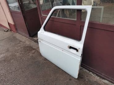 polovne letnje gume 215 55 r16: Dodatni opis Vrata leva Lada 21213,21214 Niva u beloj boji. Polovna — 4