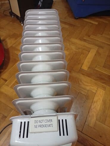 Donji delovi trenerke: Ulje­ni radijator na točkićima - Tip: električni uljni radijator sa — 3