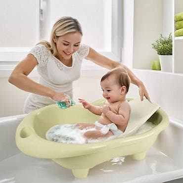 Kadica set za kupanje bebe Dolu 072696-60 Set za kupanje se sastoji
