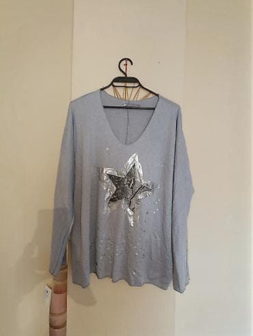 Siva ženska bluza dugih rukava sa V-izrezom. Na prednjoj strani nalazi na lalafo.rs Siva ženska bluza dugih rukava sa V-izrezom. Na prednjoj strani nalazi