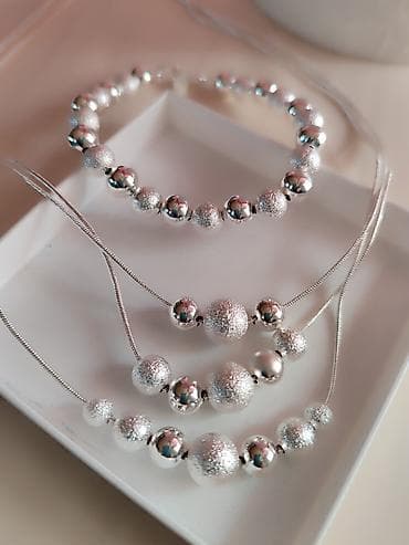 prada ogrlica: Set nakita žig 925 Elegantni srebrni set zig 925, sastavljen od: - — 4
