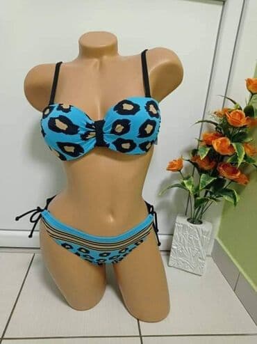 lindex kupaći kostimi: Plavi 38 40 44
Roze 42
Cena 1500 din — 2