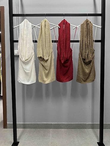 cameleon odeća: Ženska mini haljina sa dubokim drape dekolteom
2500
Din
S M L — 5