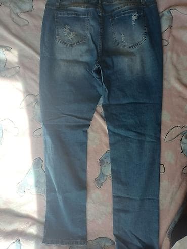 leprsave pantalone: Ženske farmerke sa leopard umetnutim patch detaljima - Model — 1