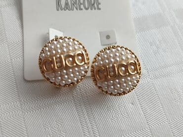 halteri h m: Klipse, Gucci — 1