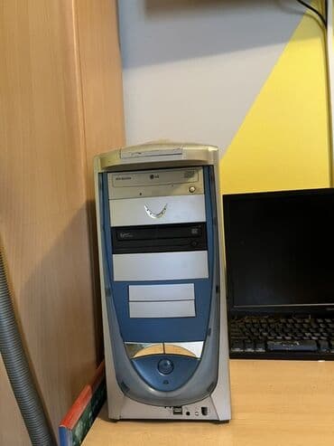 ugradni sporet na plin: Računarski toranj sa futurističkim dizajnom, kombinacijom srebrne i — 1