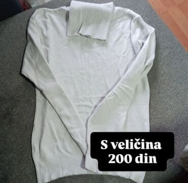 Donji delovi trenerke: Bela ženska rolka sa dugim rukavima. Mekana, tanja pletenina sa — 1