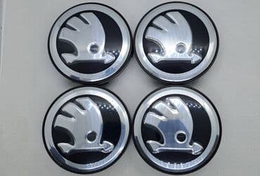 20555 r16 felni: Čepovi za felne ŠKODA - set 4 komada Čepovi za felne sa logom ŠKODA - — 2
