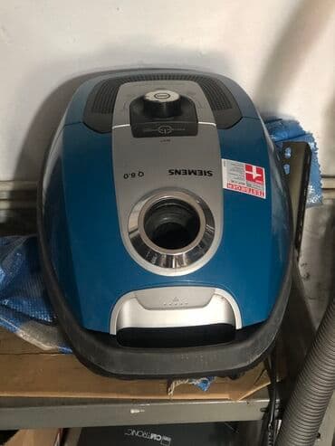 fisher usisivaci: Usisivač LG Turbo Z snage 1500W. Kompaktan, crveno-crni dizajn sa — 4