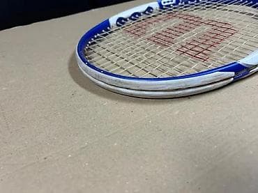 orphan first kill sa prevodim: Wilson teniski reket - Model: Wilson (plavo-bela šema, “W” logo na — 8