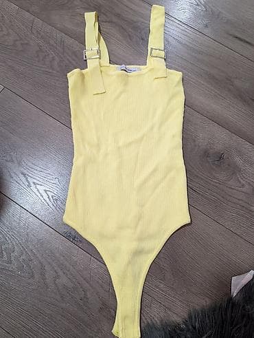 haljine 2023: Ženski bodi Dilvin Knit – žuta boja - Materijal: rebrasta pletena — 1