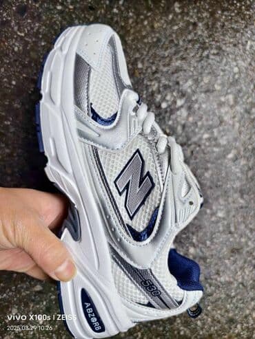 pantalone sa grejacima: New Balance, bоја - Bela — 2