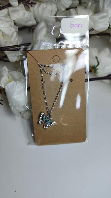 rajf za bebe: Ogrlica sa priveskom leptira - Tanak lančić u srebrnom tonu - — 1
