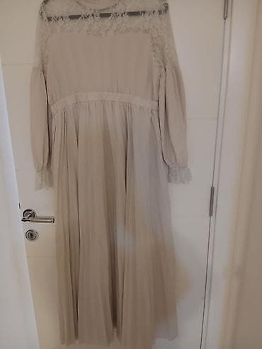 Dugačka elegantna haljina u bež/boja šampanjca nijansi. - Model: maxi