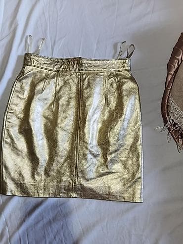 Zlatna mini suknja od prave kože, brenda Alba Moda (etiketa unutra) na lalafo.rs Zlatna mini suknja od prave kože, brenda Alba Moda (etiketa unutra)