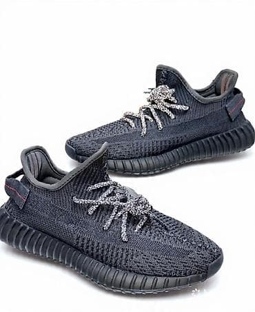 muska cipela: Crne sportske patike sa pletenim gornjištem i dekorativnim metalnim — 1