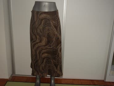 duge suknje gde kupiti: Suknja CANDA 42
poliester
sirina pojasa 42-50 bokova 67 duzina 82 — 1