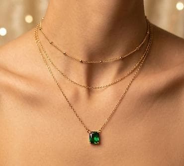 rucni nakit: Zlatni višeslojni lančić sa privjeskom – elegantan set od tri tankа — 1