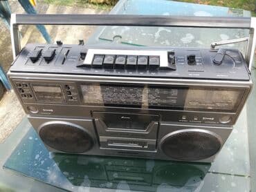 Headphones: Universum ctr 2304u. -radio ispravno. -dek premotava levo i desno — 6