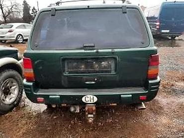 digalka za kola: JEEP GRAND CEEROKE 5.9 2KOM STRANCI | Kompletan je u odlicnom stanju — 2