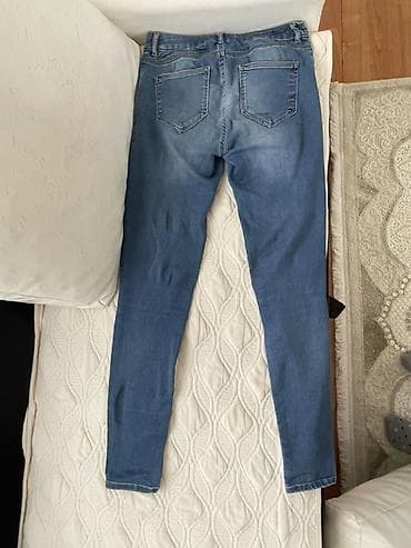 k3 čizme: Ženske skinny farmerke sa poderotinama - Model: uske (skinny) — 2