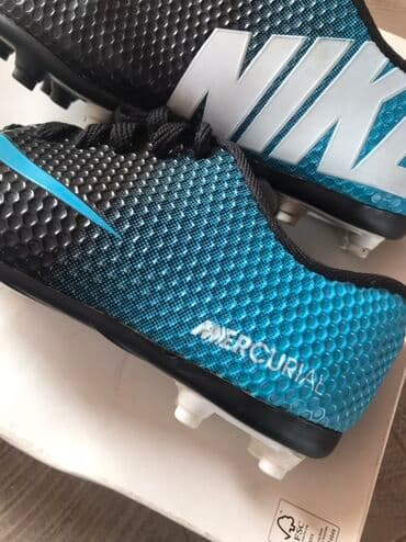 Kopačke: Unisex kopačke za fudbal, model Nike Mercurial, crne boje sa plavim