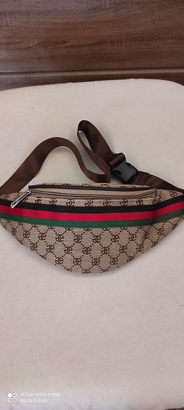 Pojasna torbica kao nova, jak podesiv kais.
38cm X 14 na lalafo.rs Pojasna torbica kao nova, jak podesiv kais.
38cm X 14