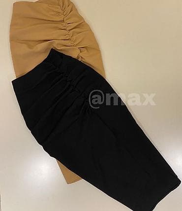 Suknja sa slicem nabrana sa elastinom. svetlo siva,tamno