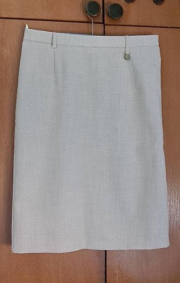 Bež suknja, nešto ispod kolena, veličina 38, šlic pozadi na lalafo.rs Bež suknja, nešto ispod kolena, veličina 38, šlic pozadi