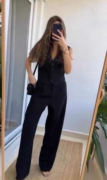 kompleti zenski: Elegantno žensko odelo koje se sastoji od prsluka sa V-izrezom i — 1