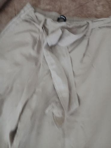 ideal majice: Ženske široke pantalone – bež - Kroj: široke nogavice — 3