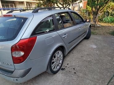 kuciste kljuca opel corsa c: Renault Laguna karavan, srebrne boje, sa krovnim nosačima. Poseduje — 3