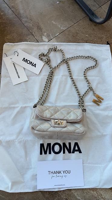 Mona kozna tasnica. Upotrebljena par puta. Dolazi uz originalnu