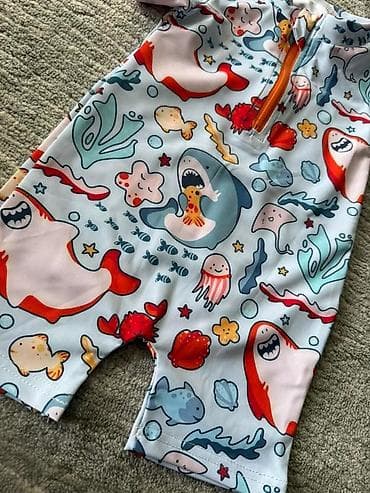 letnji kompleti za zene: Dečiji jednodijelni kupaći kostim sa kratkim rukavima (rashguard — 4