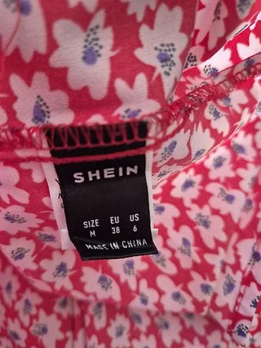 pull and bear prsluci: Ženska letnja bluza bez rukava sa volanima i cvetnim dezenom. - — 4