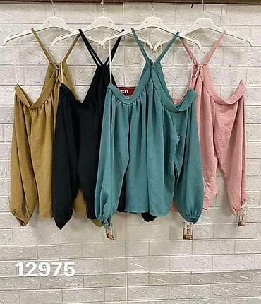 carrano: Ženska bluza sa golim ramenima i halter vezom
1900 din
S M L — 5