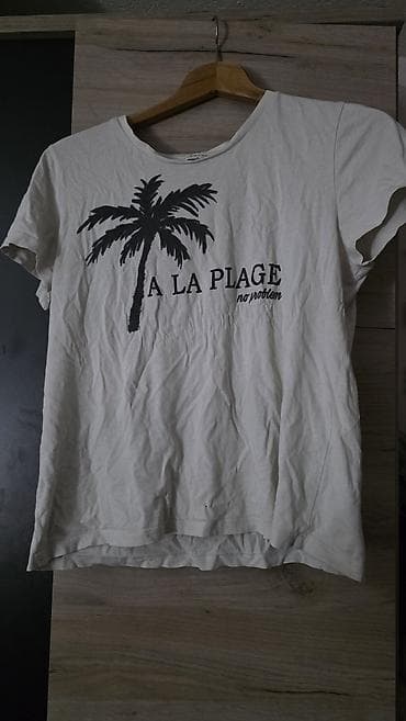 patike sa znakom n: Ženska majica kratkih rukava sa printom palme i natpisom “A LA PLAGE – — 2
