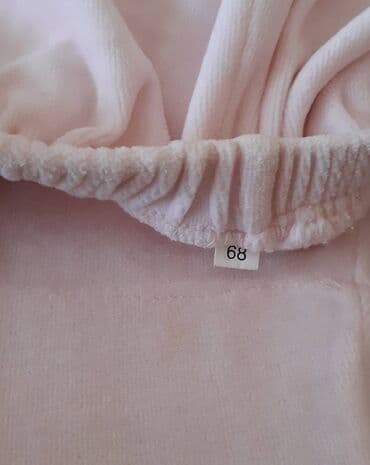 nike trenerke sive: Dečije pantalone u nežnoj roze boji, veličine 68, pogodne za uzrast od — 2