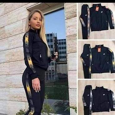 nike 125: Ženski komplet trenerke gornii i donji deo. - Boja: crna sa trakama — 1
