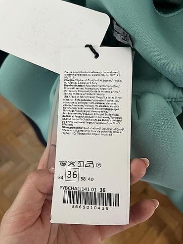 duks s: Elegantna plisirana suknja u mint zelenoj boji. Asimetričan kroj sa — 2