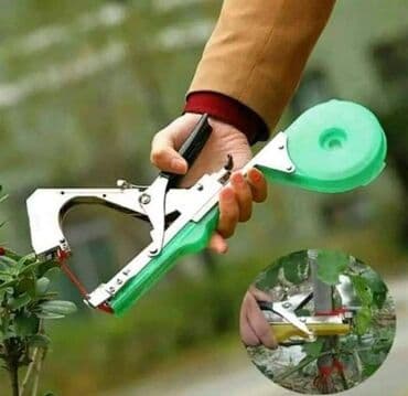 Baštenski alati i oprema: Makaze za vezivanje voca - tapetool. Cena 2700din. Vezačica tapetool — 1