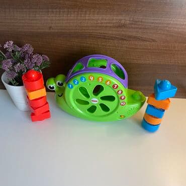 volan igracka za decu: Fisher Price muzicki interaktivni puz sa kockama razlicitog oblika — 5