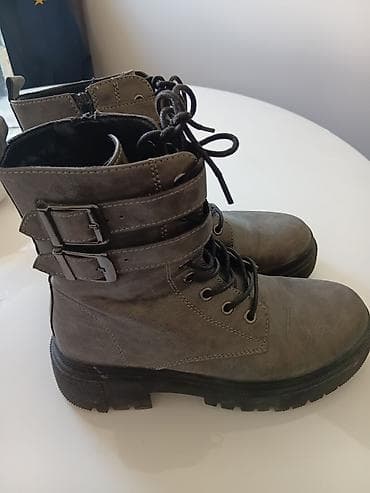 patike za zimu nike: Ženske kožne gležnjače u sivoj boji, robusnog „combat“ stila. - — 1