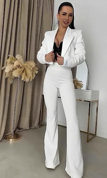 Haljine: Kompleti
Cena 3600
Uni vel.
V30 — 1