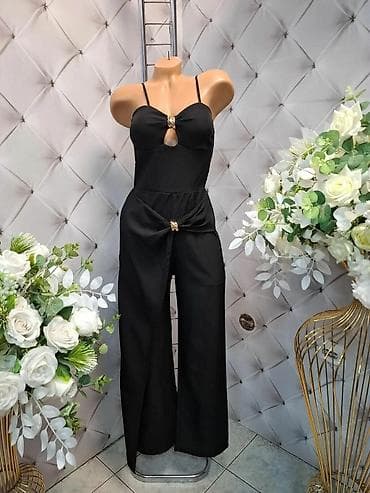 blondy komplet: Elegantni crni kombinezon sa širokim nogavicama - Model bez rukava sa — 1