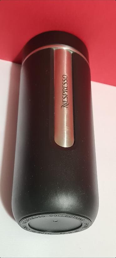 Sobne biljke: Nespresso Nomad termo putna šolja u crnoj boji.  Predmet nije nov, ali — 2