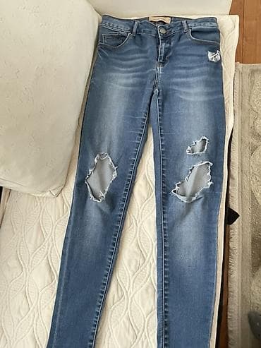 k3 čizme: Ženske skinny farmerke sa poderotinama - Model: uske (skinny) — 1