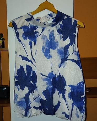 дечија игра 3: Ženske trenerke i haljina – set različitih komada 1) Crne sportske — 9