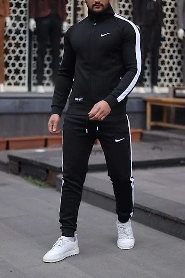 Nike muška trenerka crna sa belim linijama NOVO Novo Mokra likra na lalafo.rs Nike muška trenerka crna sa belim linijama NOVO Novo Mokra likra