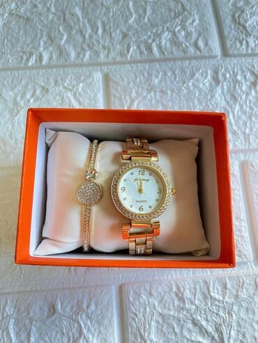 tommy hilfiger d: Narukvica i sat 
2500 din — 3